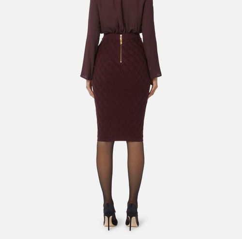 Skirt in knit fabric with diamonds and jewel details