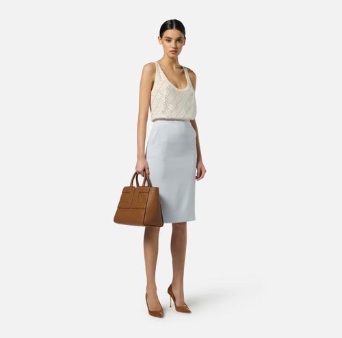 Skirt in crêpe fabric with logo ribbon