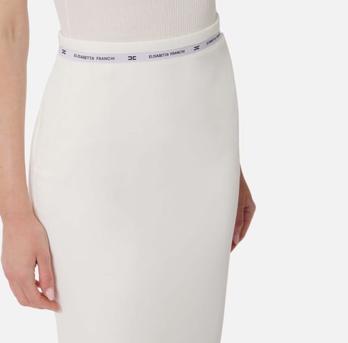 Skirt in crêpe fabric with logo ribbon
