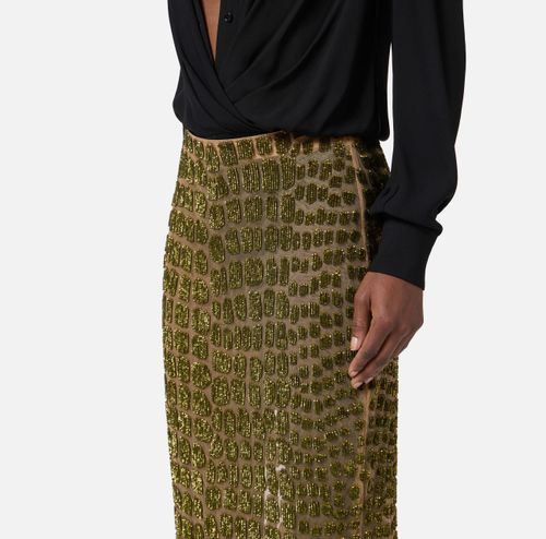 Skirt in tulle fabric with crocodile embroideries