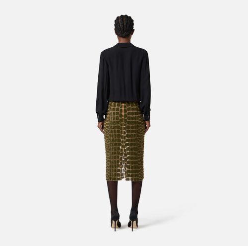 Skirt in tulle fabric with crocodile embroideries