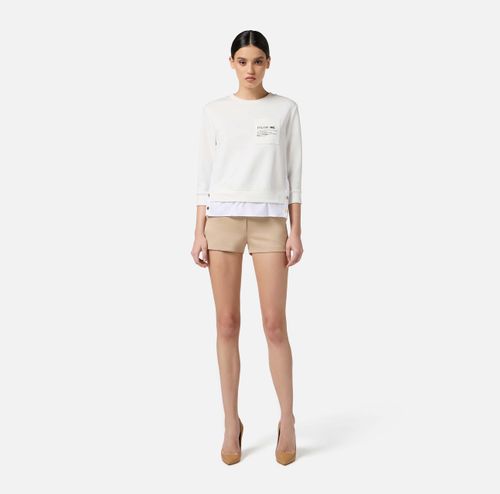 Fleece top with details in poplin fabric