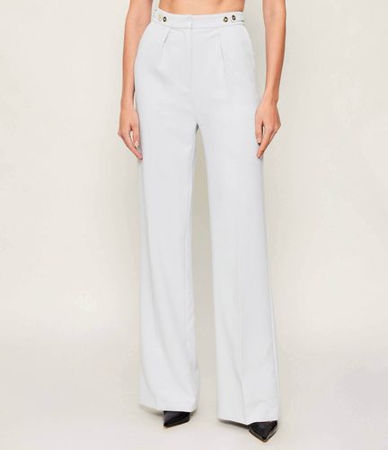 Trousers in crêpe fabric with jewel accessory