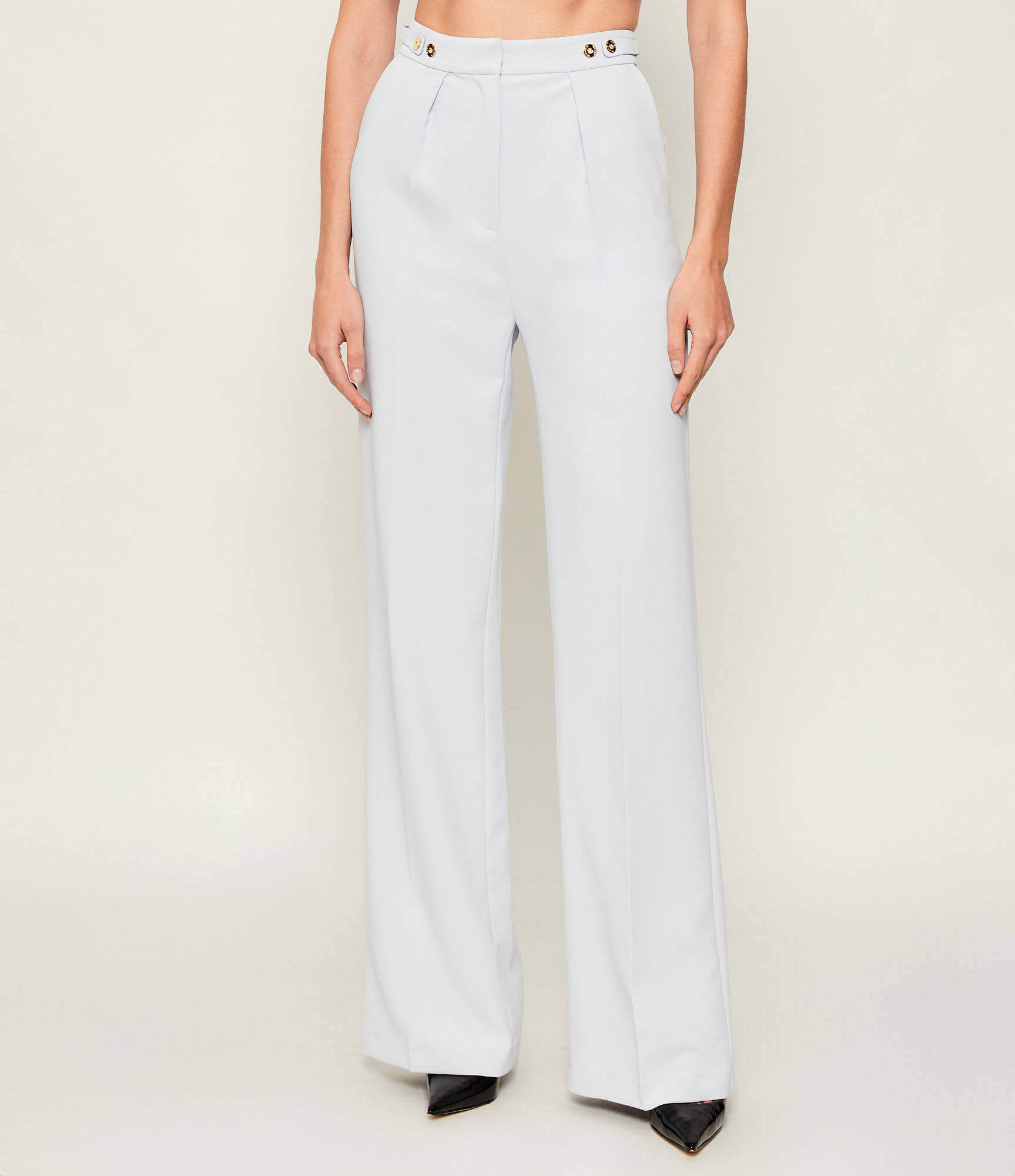 Trousers in crêpe fabric with jewel accessory