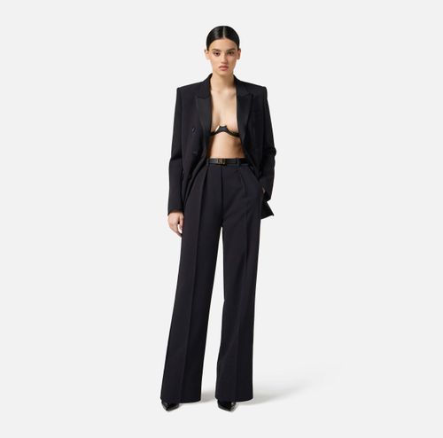 Trousers in lightweight crêpe fabric with tuxedo details