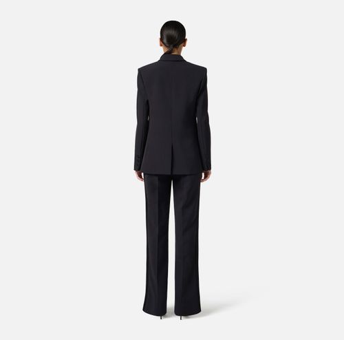 Trousers in lightweight crêpe fabric with tuxedo details