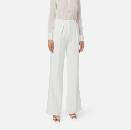 Trousers in lightweight crêpe fabric with tuxedo details