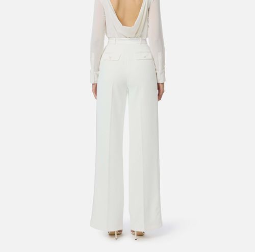 Trousers in lightweight crêpe fabric with tuxedo details