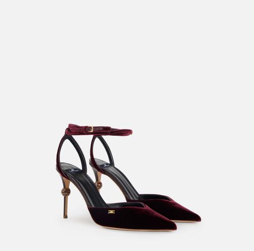 Velvet slingback with jeweled heel