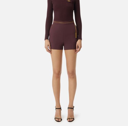 Shorts in lightweight crêpe fabric with jewel chain