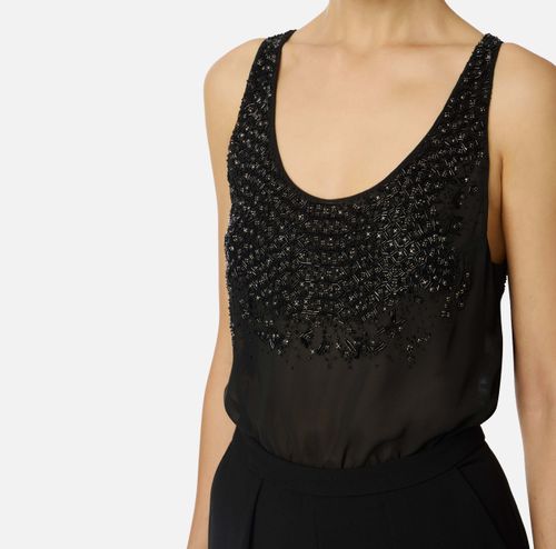 Jumpsuit in georgette and crêpe fabrics with crystals