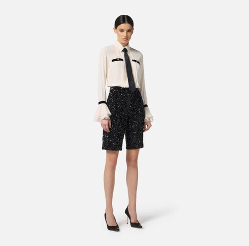Jumpsuit in georgette fabric with sequins and tie