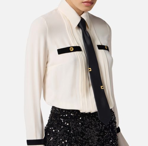 Jumpsuit in georgette fabric with sequins and tie