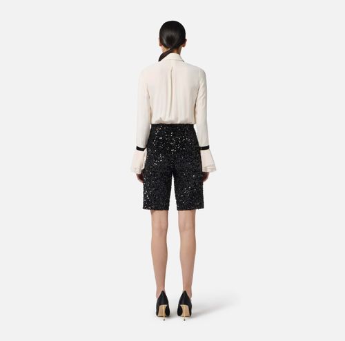 Jumpsuit in georgette fabric with sequins and tie