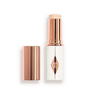 מייקאפ סטיק זוהר וקל של שרלוט Charlotte Tilbury  Unreal Skin Sheer Glow Tint Hydrating Foundation Stick