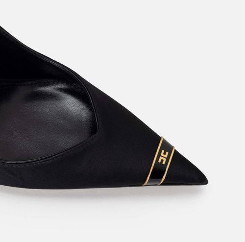 Pumps with sculpted heel