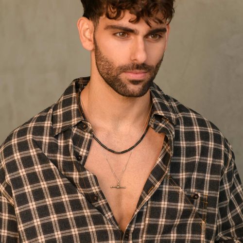 מזוודה אנרגטית - שרשרת גליל אוניקס וערכת קריסטלים לגבר