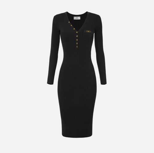 Dress in ribbed knit fabric with breast pocket