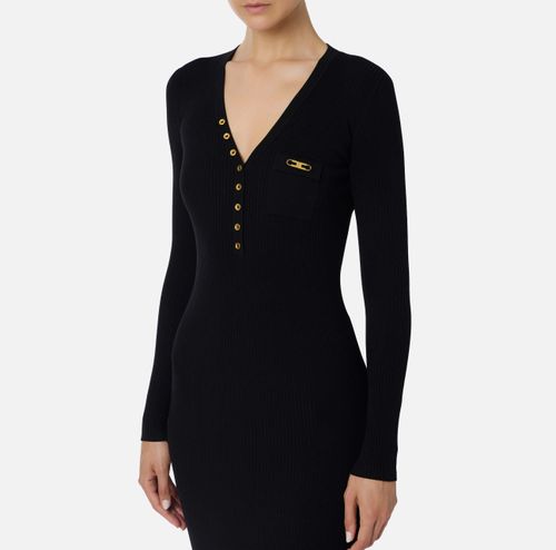 Dress in ribbed knit fabric with breast pocket