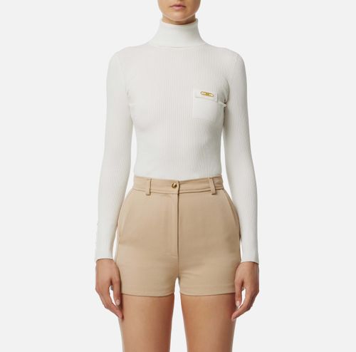 Ribbed knit top with breast pocket
