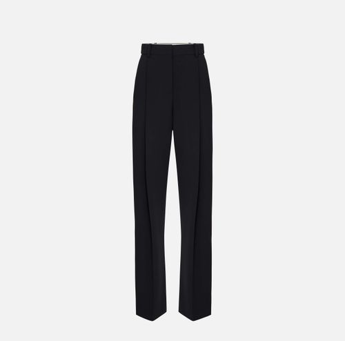 Trousers in lightweight crêpe fabric with darts