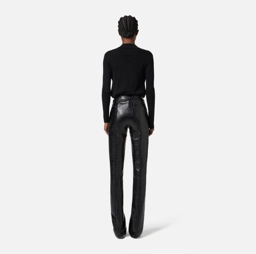 Trousers with crocodile print
