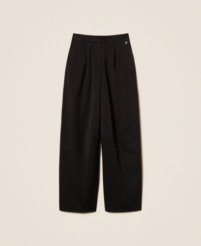 Palazzo trousers with pleats