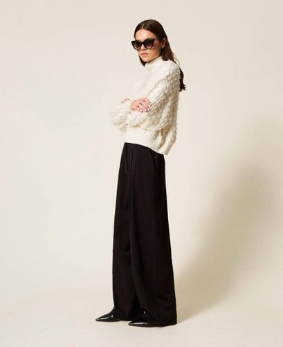 Palazzo trousers with pleats