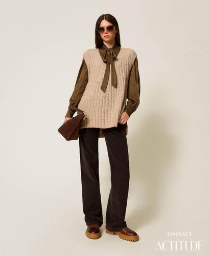 Knit gilet with sequins