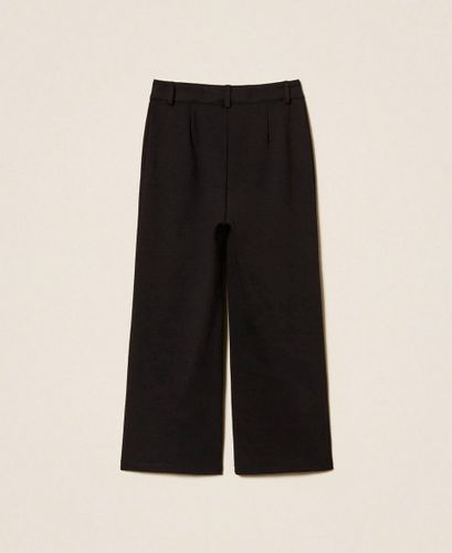 Girls' palazzo trousers with Oval T buttons