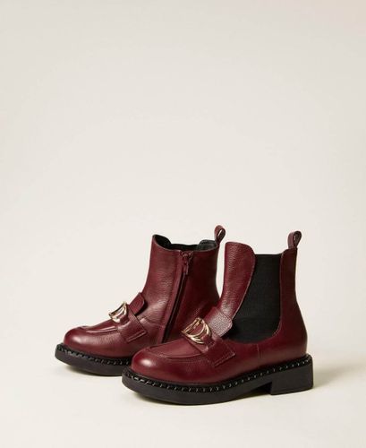Chelsea leather boots with Oval T