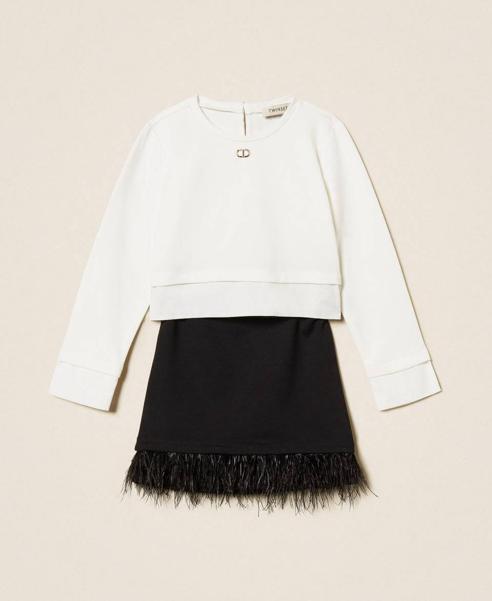 Blouse and skirt with feathers