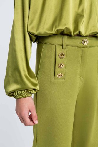 Palazzo trousers with Oval T buttons