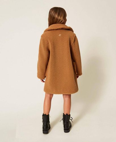 Double-breasted faux fur coat