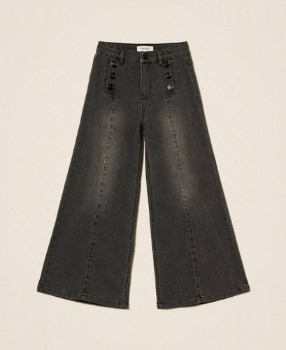 Wide leg jeans with logo buttons