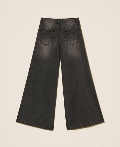 Wide leg jeans with logo buttons