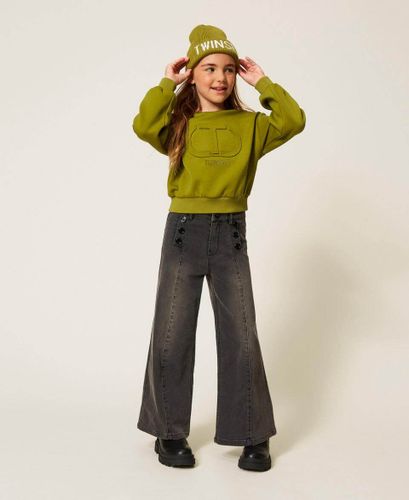 Wide leg jeans with logo buttons
