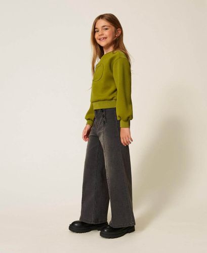 Wide leg jeans with logo buttons