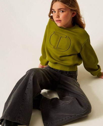 Wide leg jeans with logo buttons