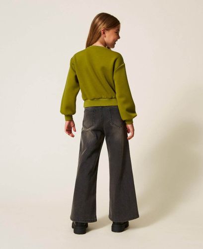 Wide leg jeans with logo buttons