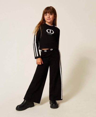 Jumper with logo and wide trousers