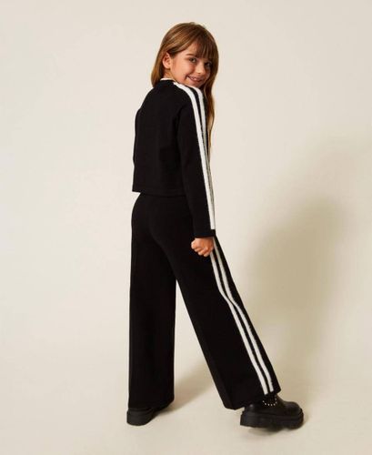 Jumper with logo and wide trousers