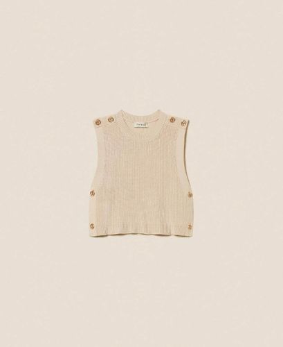 Sleeveless knit jumper with Oval T buttons