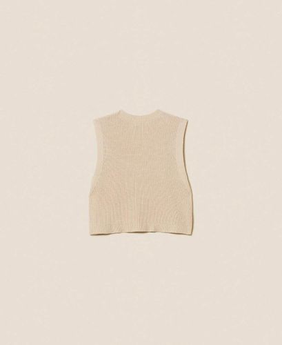 Sleeveless knit jumper with Oval T buttons