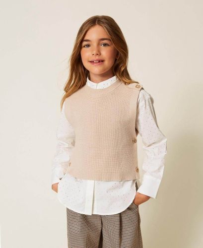Sleeveless knit jumper with Oval T buttons