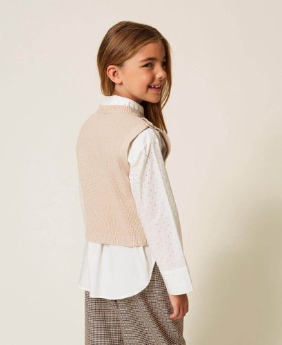 Sleeveless knit jumper with Oval T buttons