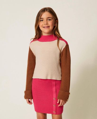Knit miniskirt with Oval T buttons