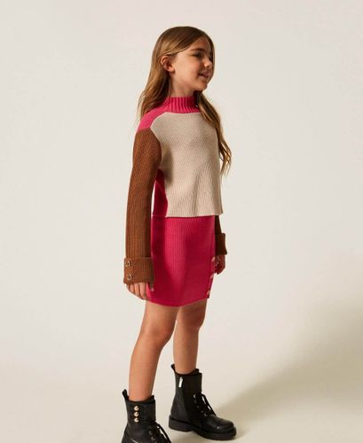Knit miniskirt with Oval T buttons