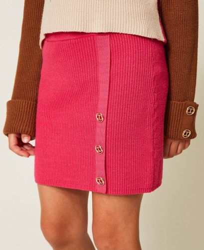 Knit miniskirt with Oval T buttons