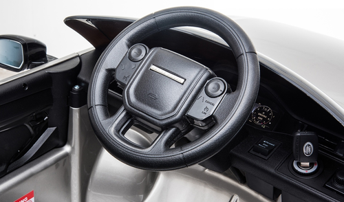 מכונית ממונעת 12V לילדים בדמות ריינג' רובר Range Rover Evoque עם שלט רחוק, אורות ומושב כפול - לבן 4